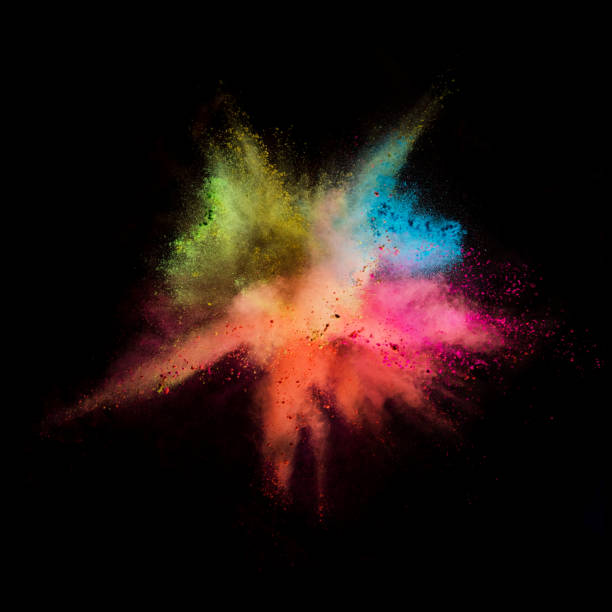 istock Explosion of coloured powder isolated on black background. 1021608474