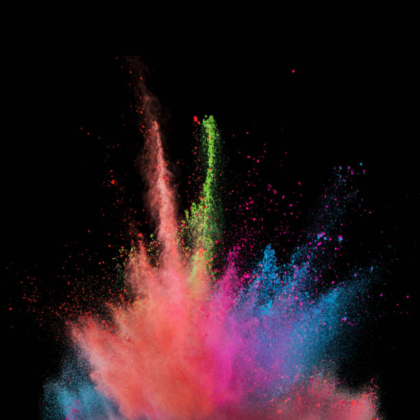 istock Explosion of coloured powder isolated on black background. 1021608476