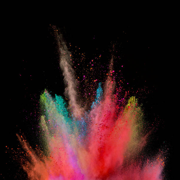 istock Explosion of coloured powder isolated on black background. 1021608512