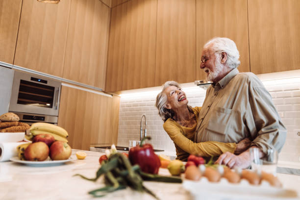 istock senior couple cooking in the kitchen 1021608556