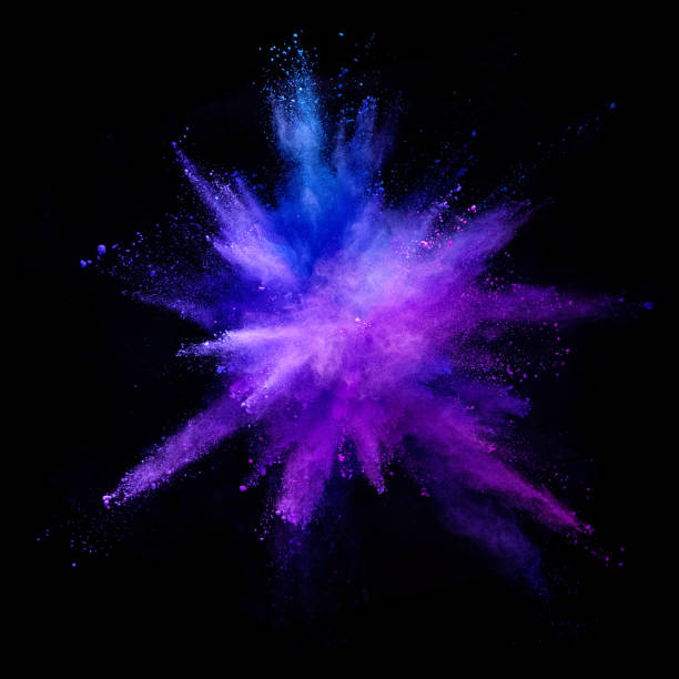 istock Explosion of coloured powder isolated on black background. 1021608570