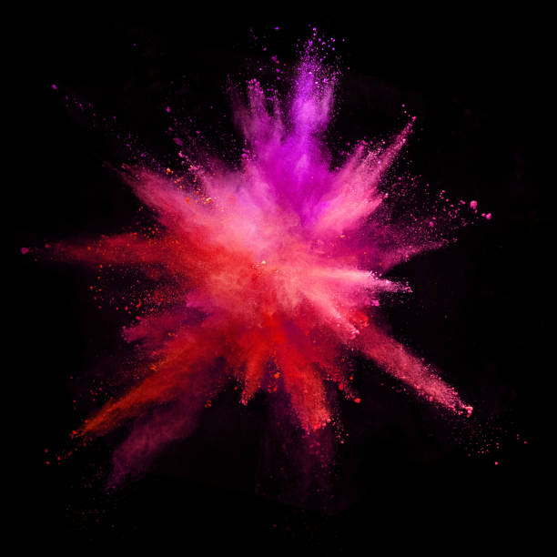 istock Explosion of coloured powder isolated on black background. 1021608588