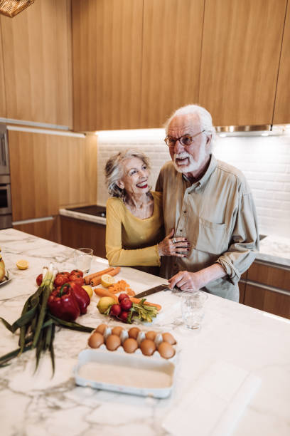 istock senior couple cooking in the kitchen 1021608610