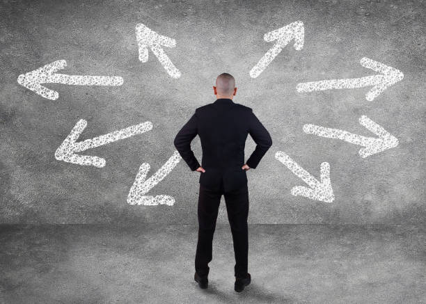 istock Businessman Confuse to Choose Direction 1021611424