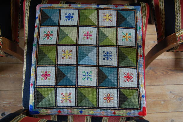 istock Cushion with cross stitch, 5. 1021620768