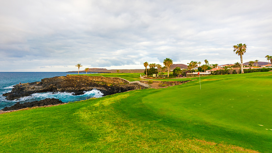 Golf course along rocky coastline. Tenerife, Spain.