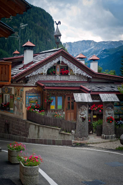 Canazei, traditional alpine house Traditional alpine house of Canazei, Dolomites catinaccio stock pictures, royalty-free photos & images