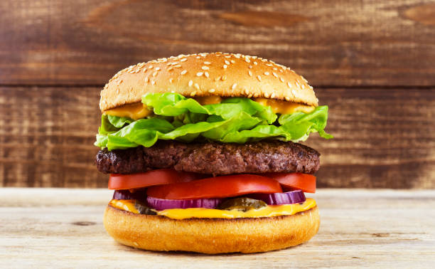 istock burger against the background of a tree 1021637990