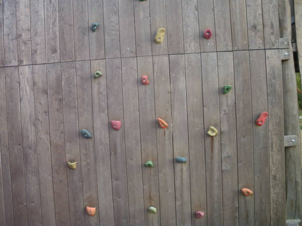 istock Public playground climbing wall for ten year olds 1021638210