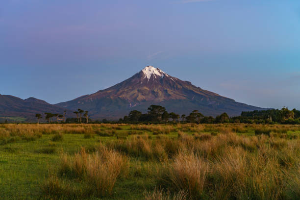 istock blue hour at cone volcano mount taranaki, new zealand 2 1021645110