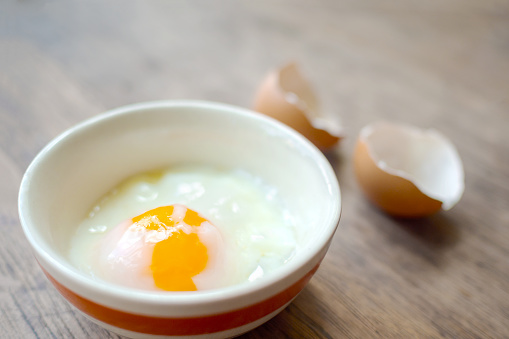 Onsen tamago egg or soft-boiled egg in traditional Japanese with copy space