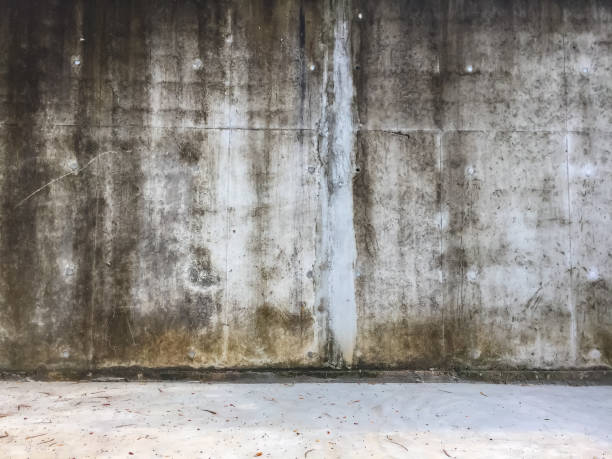 istock Old dirty white cement wall,Stained concrete background texture. 1021655784