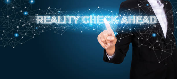 istock Reality Check Ahead concept with Hand of business pressing a button Reality Check Ahead. 1021656270