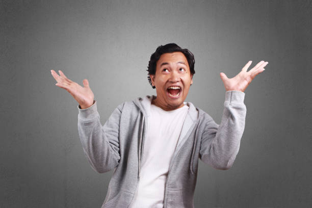 istock Man Looked Up With Open Arms 1021656362