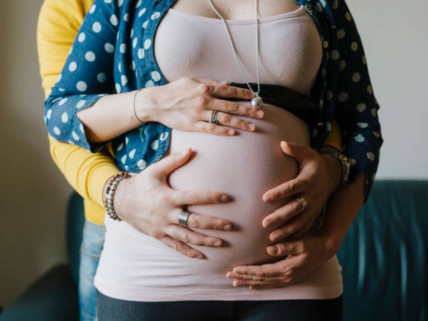 istock Future parents couple together at home 1021656658
