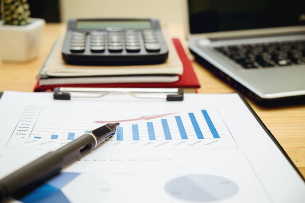 istock business documents on office table with laptop computer and graph financial with social network diagram 1021664294