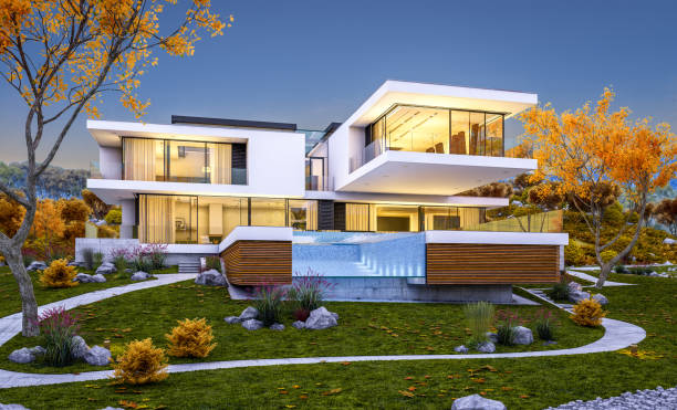 istock 3d rendering of modern cozy house by the river. Cool autumn evening with soft light. 1021664422