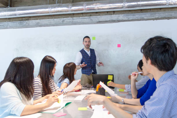 istock Businessman giving presentation 1021671354