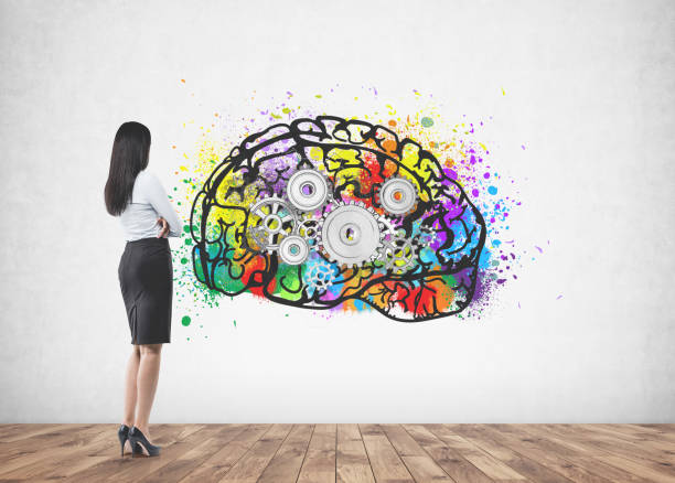 istock Businesswoman looking at wall, brainstorm 1021674468