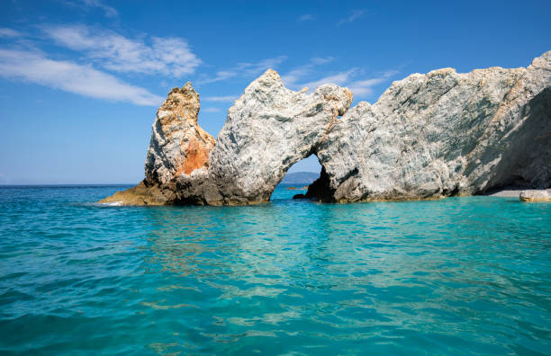 istock The rock with a hole in Lalaria Beach, Skiathos 1021679714
