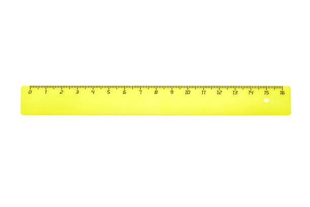istock Yellow plastic stationery ruler isolated on white background 1021682234