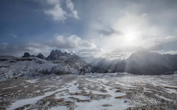 Snowy landscape in the dolomites with dramatic light