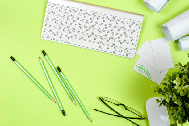 istock Workplace of architect - rolls and plans. Construction background. 1021684658