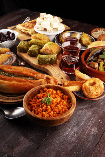 istock Middle eastern or arabic dishes and assorted meze, concrete rustic background. sambusak. Turkish Dessert Baklava with pistachio. Sarma. Halal food. Lebanese 1021684826