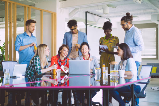 istock Colleagues brainstorming together with their team lead 1021688216