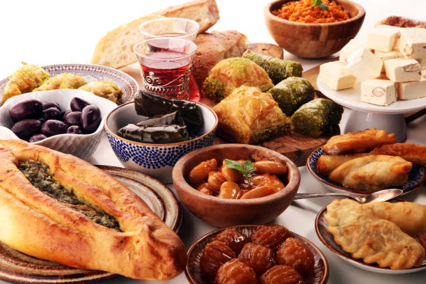 istock Middle eastern or arabic dishes and assorted meze, concrete rustic background. sambusak. Turkish Dessert Baklava with pistachio. Sarma. Halal food. Lebanese 1021688746