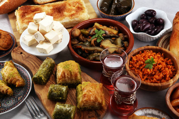 istock Middle eastern or arabic dishes and assorted meze, concrete rustic background. sambusak. Turkish Dessert Baklava with pistachio. Sarma. Halal food. Lebanese 1021689158