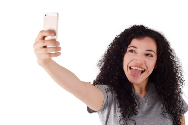 istock Young woman taking selfie with smartphone 1021694514