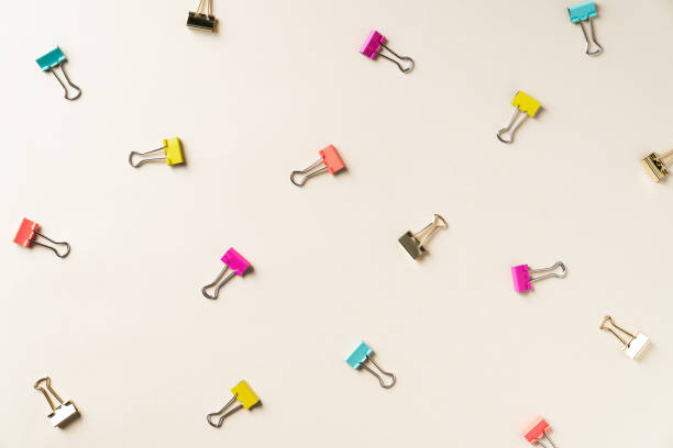 Thumbtack on yellow background