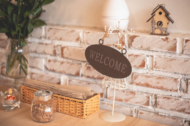 istock welcome label on the wood table 1021697594