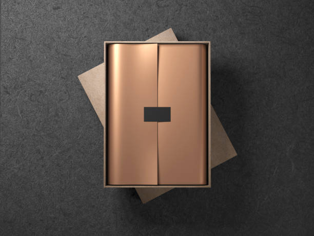 istock Cardboard Box with Golden wrapping paper and black label sticker 1021697934
