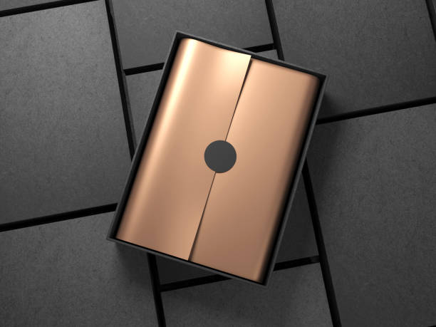 istock Black Box with Copper Gold wrapping paper and black circle sticker 1021697938