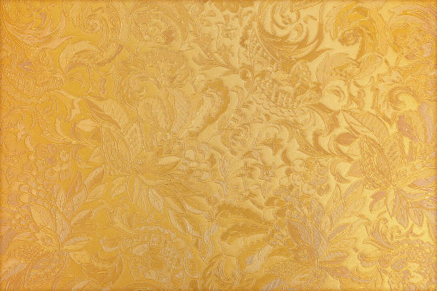 istock Golden floral ornament brocade textile pattern 1021698094