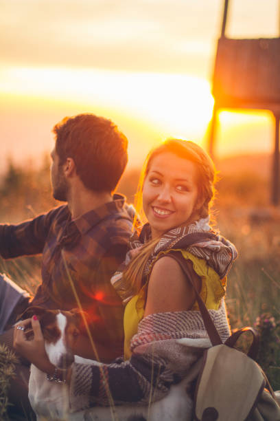 istock Couple enjoying a sunny day with dog 1021702754