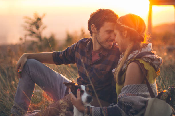 istock Couple enjoying a sunny day with dog 1021703550