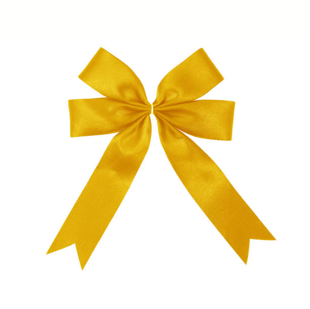istock yellow gold satin Ribbon bow Isolated on white 1021706590