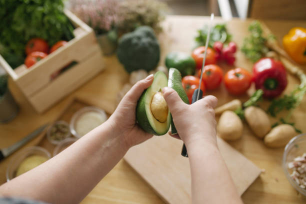 istock Man preparing vegan meal in domestic kitchen 1021709858