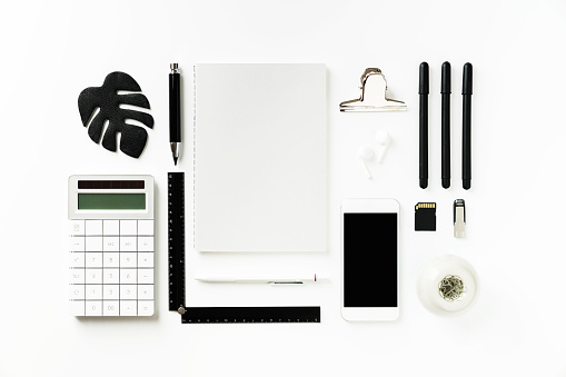 Back to school black and white flat lay on white background