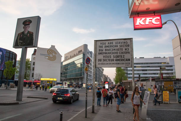 Berlin Germany - April 20. 2018: Tourists near border post Checkpoint Charlie