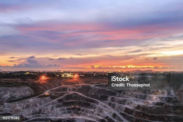 Aerial View Of Opencast Mining Quarry With Lots Of Machinery At Work Stock Photo - Download Image Now