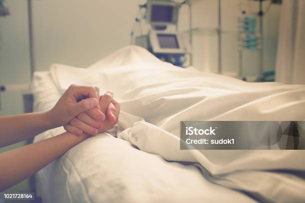 Woman Mourns Her Husband Who Died In A Hospital Stock Photo - Download Image Now - Death, Dead, Hospital