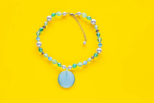 Bead Necklace on color background.