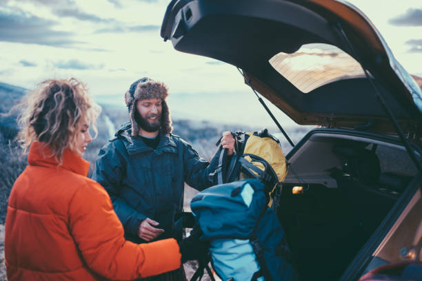 istock Couple on winter hiking trip 1021733934