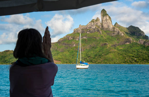 istock Boat deck yoga at Bora Bora 1021734452