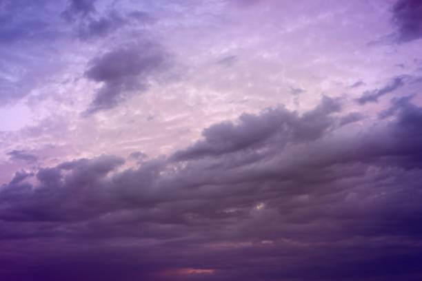 istock beautiful colorful heavy clouds for using in design as background. 1021734666