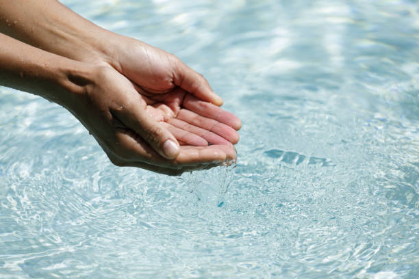 istock Clear water in woman hands 1021736770